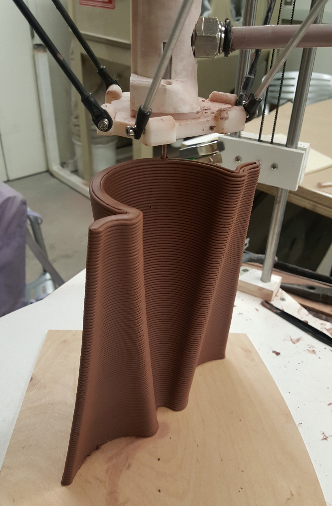 Robotic arm mid-print, side view
